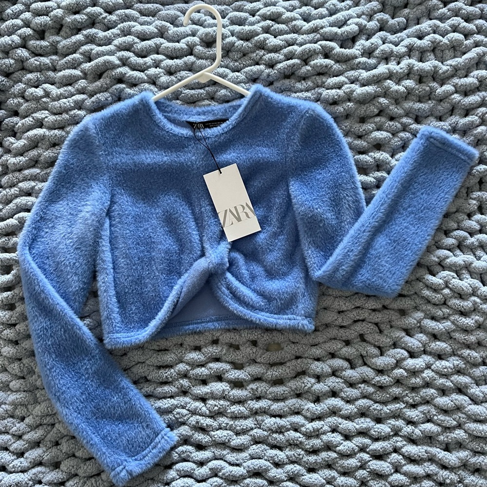 Fuzzy sweater top